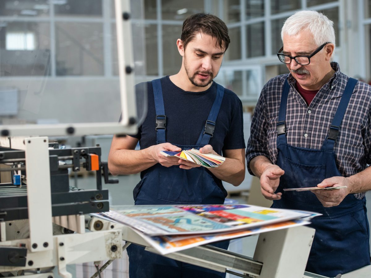 Technicians reviewing colour swatches